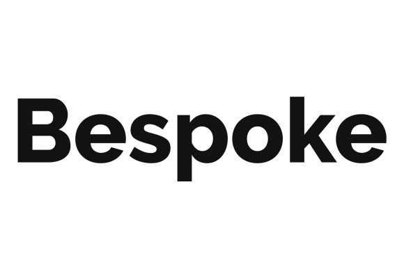 A black and white logo with the word bespoke.